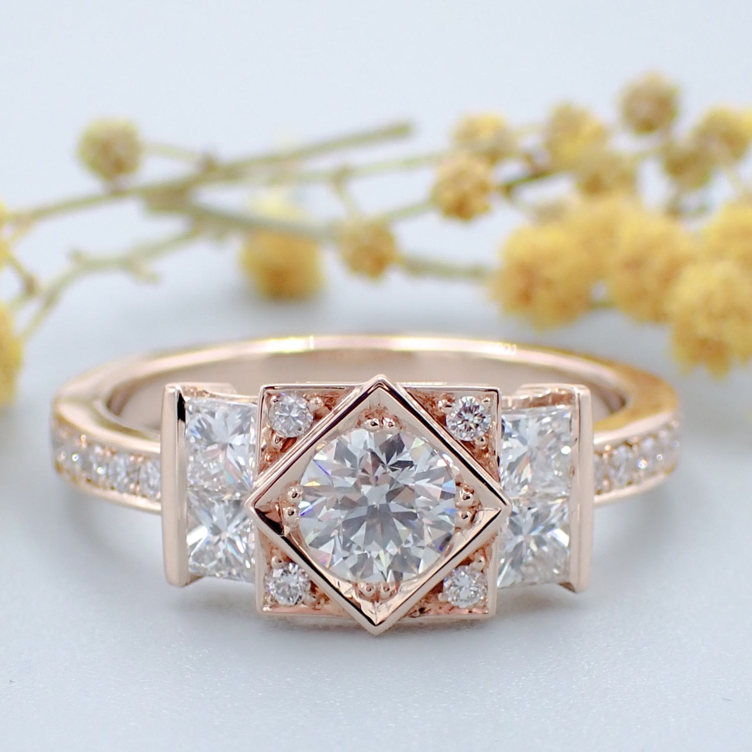 Rose gold grain set halo style engagement ring set with diamonds